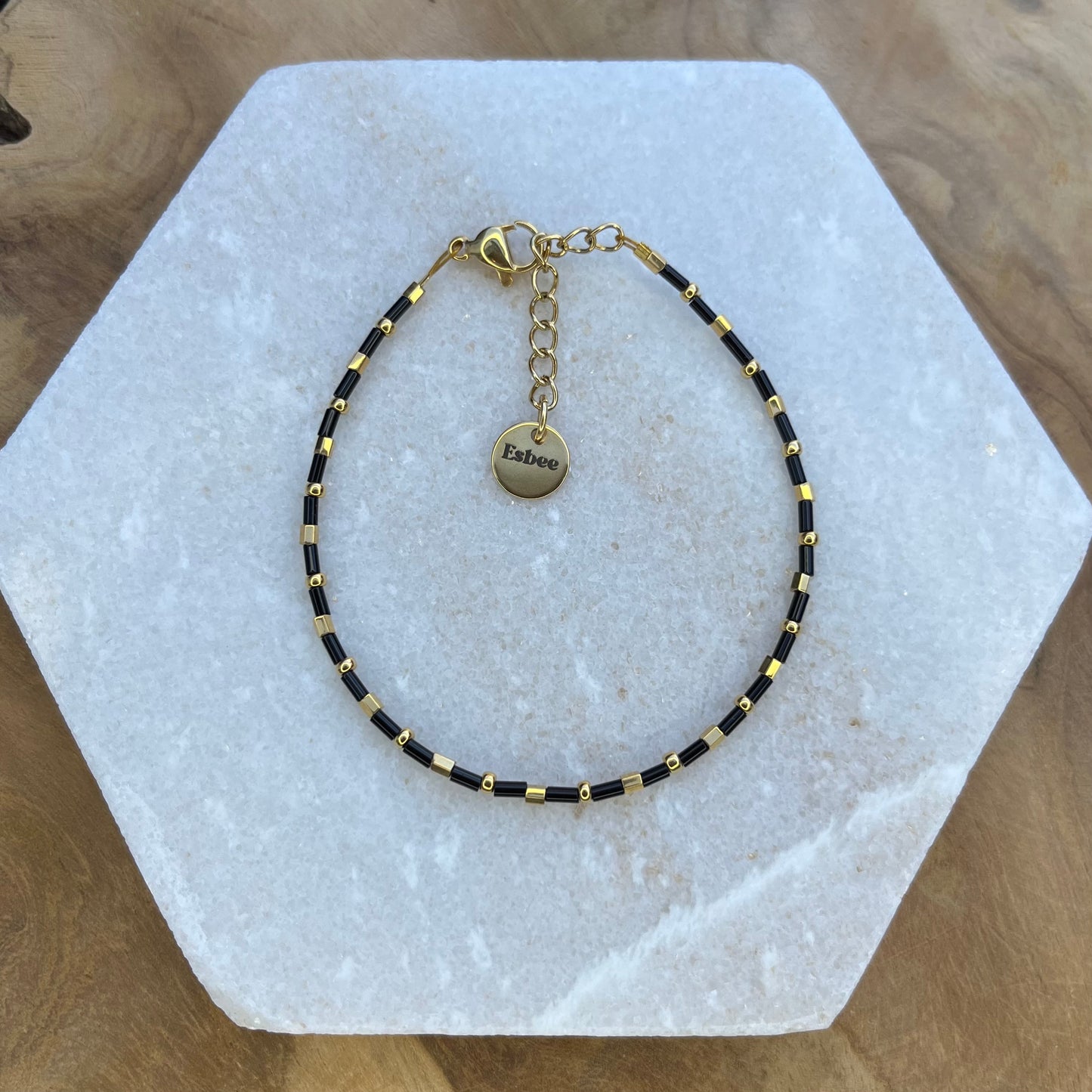 Setje armbandjes goud zwart-mauve-wit